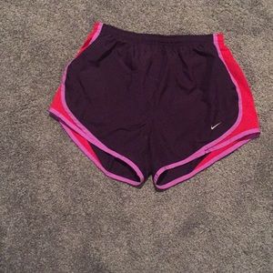 Purple Nike running shorts